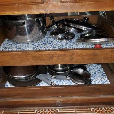 8 Cupboards Full of Kitchen Appliances and Utensils
Items include pots and pans, measuring cups, metal forks, spoons, knives, glass...