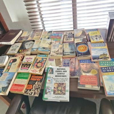 Approximately 50 Books mostly from Patrick O' Brian
Approx books and puzzles