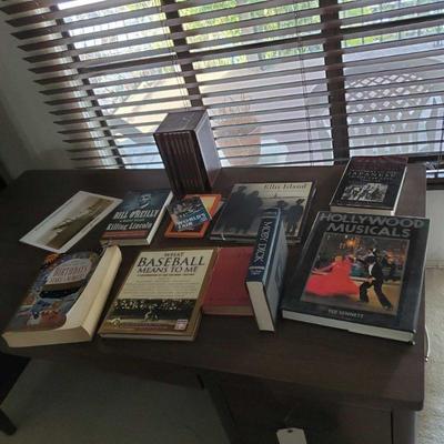 Collection of Books approximately 17 books
Baseball,Lincoln, Ellis Island, Moby Dick, Hollywood Musicals, Surviving the Sword, Let me...