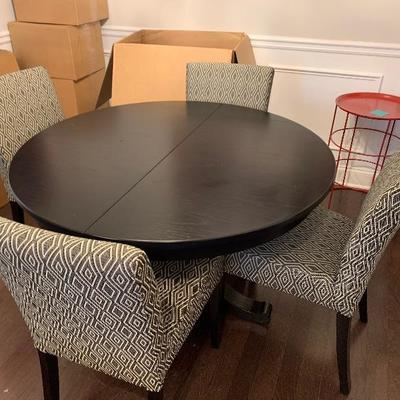 $350-Crate and Barrel Round Table with Leaf- Without leaf: 45â€ diameter; With Leaf: 60â€ oval, 29â€ tall