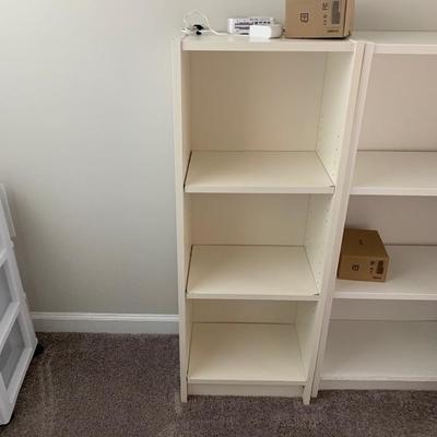 $25-This listing is for one (1) white bookshelf- There are two. 11â€ deep, 15 Â¾ â€œ wide, 42" tall