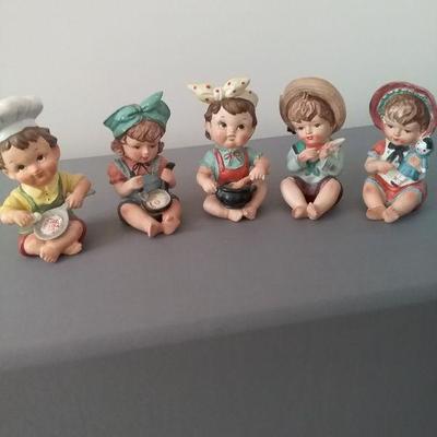 Vintage Set of Five Ceramic Piano Babies