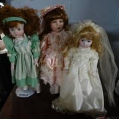 3 Porcelain Dolls on Stands