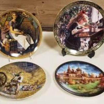 4 Collector Decorator Plates (stands not included) - 1 is Norman Rockwell