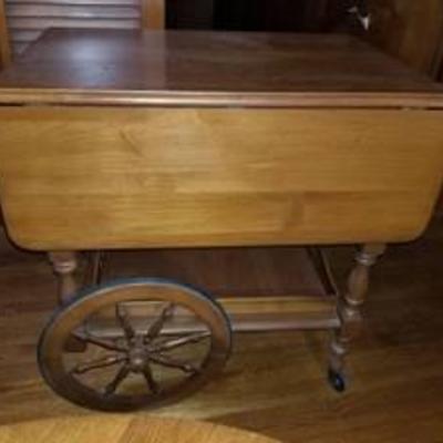 Vintage Side Table with Outer Leafs. Wheels and Lower Tray and Drawer. Contents Included