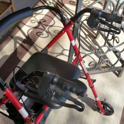 *PRESALE #77 - Ultra Light Rolling Walker by Medline, has seat, handbrakes & storage pouch, great condition, cherry red ($25)