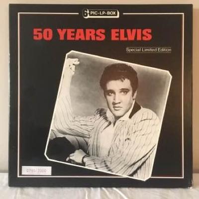 Elvis collection of records, plates, print