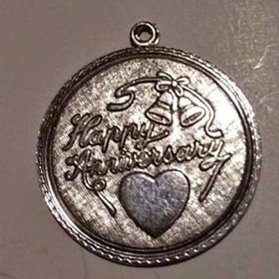 https://www.ebay.com/itm/124156095653	RX4152014 STERLING SILVER   $10.00 HAPPY ANNIVERSARY CHARM WEIGHT 5.1 GRAMS WE CAN SHIP THIS ITEM...