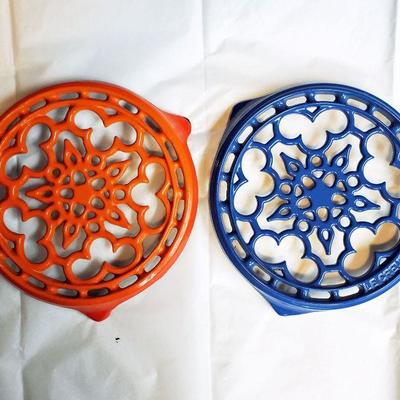 Lot 90: 2 Trivets-1 Marked Le Creuset   $40