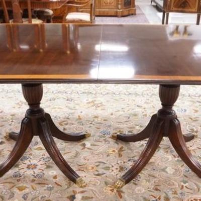 1005	STICKLEY SOLID MAHOGANY DUNCAN PHYFE SYLE BANDED DINING ROOM TABLE WITH 4 LEAVES.