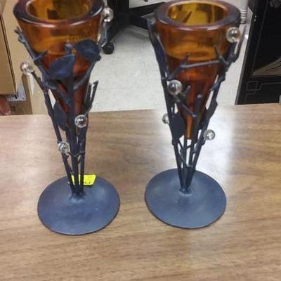 BOX041 Pair of ornate metal candle sticks. With Amber colored candle holders. Mfg. By Zodax. Made in Portugal. $10.00 BOX 41	Pay online...