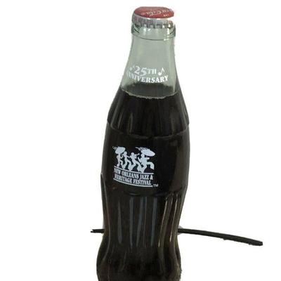 https://www.ebay.com/itm/124167266291	LAN9921: 1994 New Orleans Jazz Fest  Coke 25th Anniversary Bottle
