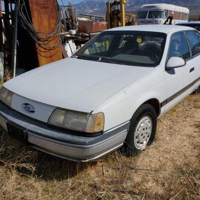 1188:	
1991 Ford Tarus
Year: 1991
Make: Ford
Model: Taurus
Vehicle Type: Passenger Car
Mileage:
Plate:
Body Type: 4 Door Sedan
Trim...