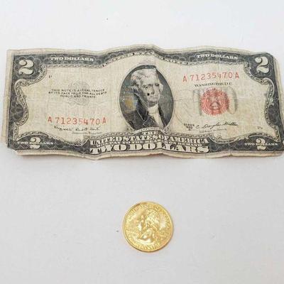 1674	
Series 1953 B, 2 Dollar Bill And Nebraska State Quarter
Series 1953 B, 2 Dollar Bill.
