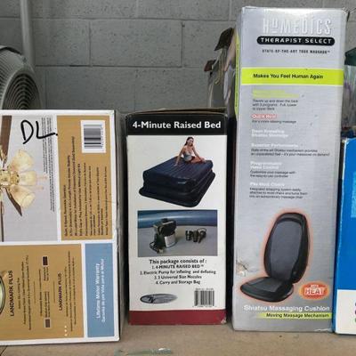 Ceiling Fan, Air inflated bed, Homedics Messaging Chir Cushion and Inflatable Raft.
