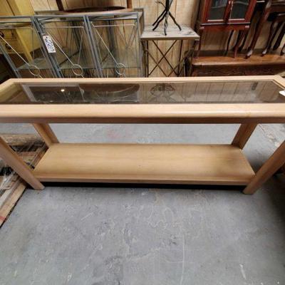 2208	
Wooden Table W/ Glass Top
Wooden Table W/ Glass Top Approximately 57"L x 24"T x 12"W