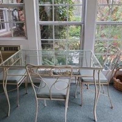 Vintage glass top table and chairs $150.00 