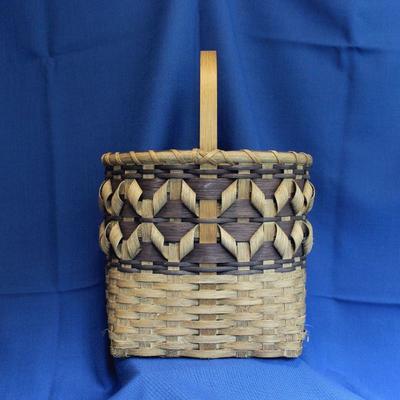 Lot 260: Eunice Hatley N.C. made Basket  $65