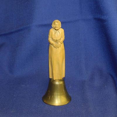 Lot 240: Brass bell with carved wood handle  $20