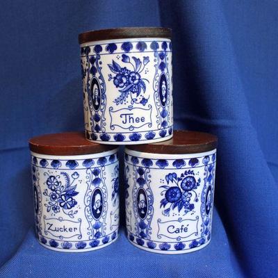 Lot 213: Set 3 Delft Ceramic Canisters with Wood Lids  $75
