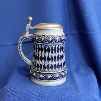 Lot 224:Western Germany Salt Glaze Lidded Stein  $30