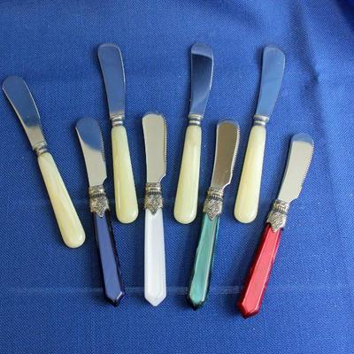 Lot 214: 8 Spreaders; 4 Jean Dubost,4 Inox, Italy $25