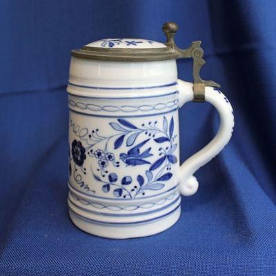 Lot227:Blue and White lidded stein with scene of lovers in bottom  $40