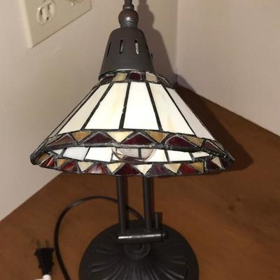 SOLD  
 Small stain glass desk lamp with adjustable arm $45