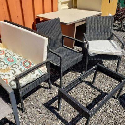 10032	

Black Wicker Four Piece Patio Set
Includes 2 Chairs, Table, And Love Seat. Love Seat Measures Approx 31