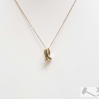 632	

10k Gold Necklace W/ Diamond Accented Pendant, 1.3g
Weighs Approx 1.3g. Measures Approx 18