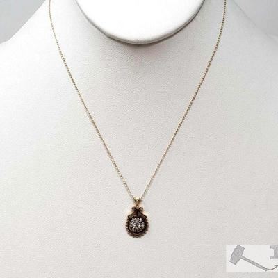 521	

14k Gold Necklace with Diamond Pendent, 2.4g
Weighs Approx 2.4g, Measures Approx 16