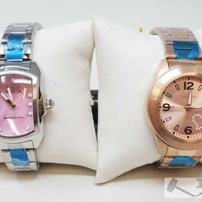 752	

Set of Two Invicta Watches
Includes rose gold Invicta watch, silver special edition invicta watch
 	 