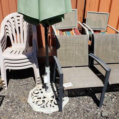 10033	

Patio Furniture, 8 Chairs, Patio Umbrella, Side Table, 3 Decorative Items
Table Measures Approx 18