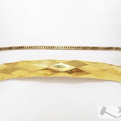 646	

2 10k Gold Bracelets, 17.9g
Includes One Chain Bracelet And One Cuff Bracelet. Weighs Approx 17.9g Together. Chain Bracelet...