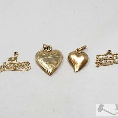 617	

4 14k Gold Necklace Pendents, 5.1g
Includes Gold Heart Locket, Gold Heart Pendant, Gold #1 Nana Pendant, And Gold Special Friend...