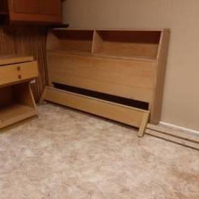 4 piece blond oak bedroom set includes full size bed, dresser with mirror, chest of drawers and night stand - in basement