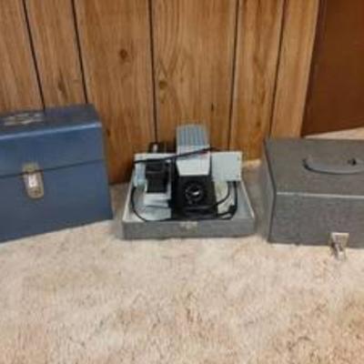 Bell and Howell slide projector and metal box