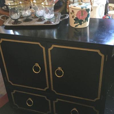 Vintage black and gold storage piece, bar, buffett, TV, extremely useful and decorative!