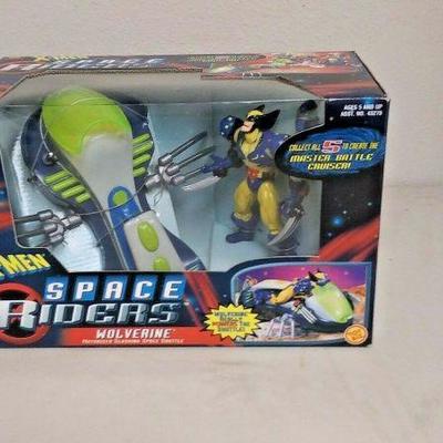 https://www.ebay.com/itm/123944358445	WY0287 MARVEL COMICS X-MEN ACTION FIGURE SPACE RIDERS WOLVERINE MOTORIZED SLAS 	 $15 
