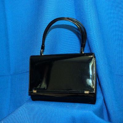 Lot 309  Black Patent Leather Purse 8 1/4 x 6 1/4 x 3 1/2  slight scratches and scuff marks   $25