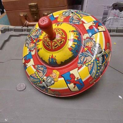 https://www.ebay.com/itm/114223711636	BU3016 VINTAGE 1950s TOY TIN SPINNING TOP 9 X 8 INCHES $30.00 CHILD KNIGHTS RIDING HORSES & CASTLES...
