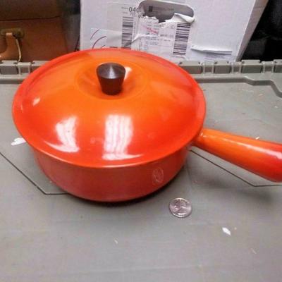 https://www.ebay.com/itm/124189457534	BU3068  USED VINTAGE LE CREUSET FLAME ORANGE #20 SAUCE PAN WITH LID  CAST IRON E	 $60 
