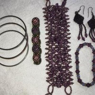 J#27 Purple beaded lot 6 bracelets & 1 pair of earrings $25. 