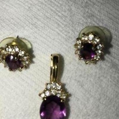 J#20 Gold tone pendant/ slide & earrings rhinestones and purple crystal $25.  