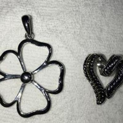 J# 49 Two Lia slides/pendants $15 