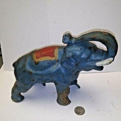 https://www.ebay.com/itm/124190459460	AB0355  VINTAGE CAST IRON PAINTED ELEPHANT BANK 9 X 7 X 3 INCHES WEIGHT 6 LBS BOX 74 AB0355	 Auction 
