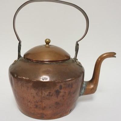 1086	DOVETAILED COPPER TEA POT. STAMPED NAME ON HANDLE-WORN. 13 IN HIGH X 12 IN WIDE