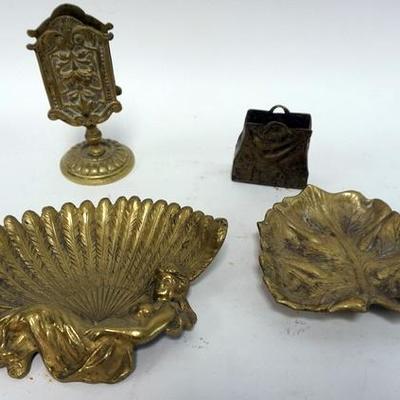 1006	4 PC. BRASS LOT CONSISTING OF 2 MATCH HOLDERS, SHELL TRAY, LEAF TRAY. SHELL TRAY 6 1/2 IN. WIDE.