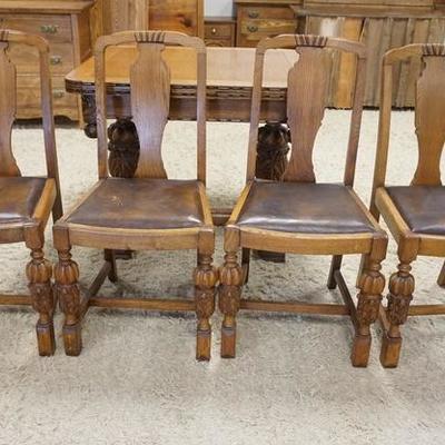 1074	ANTIQUE CARVED OAK KITCHEN SET, 4 CHAIRS AND CARVED OAK EXTENSION TABLE. 36 IN X 36 IN TABLE TOP CLOSED