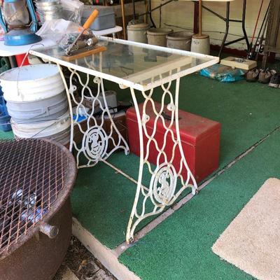 Little table made from an old sewing machine base 